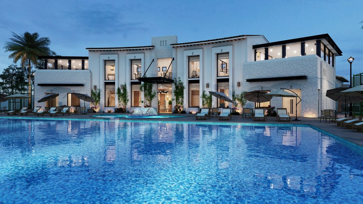 Hospitality property with pool and warm evening lighting